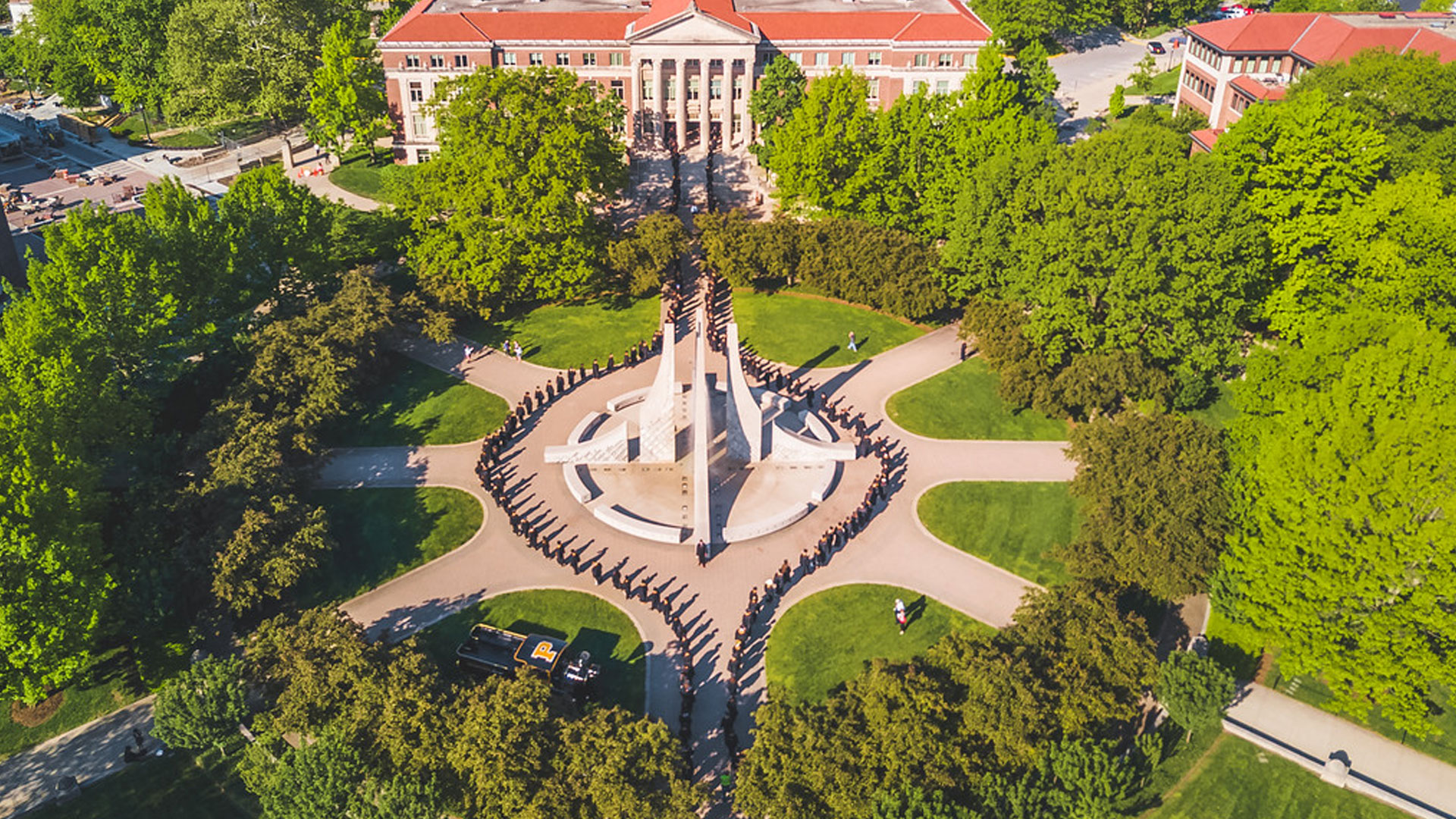 Aerial view of campus gathering.